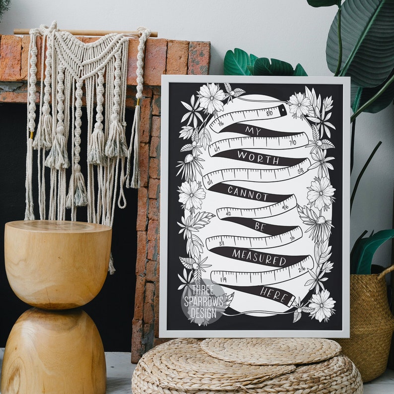 May include: Black and white printable wall art with a floral design. The text reads "My worth cannot be measured here."