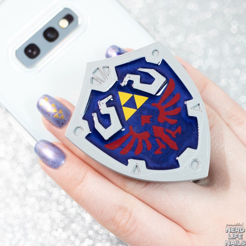 Shield Inspired Phone Grip image 1