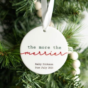 Pregnancy Announcement Christmas Ornament | The More the Merrier Baby On the Way Ceramic Holiday Ornament | Expecting Parents Grandparents