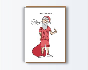 May include: A humorous greeting card featuring a cartoon illustration of a hipster Santa Claus. He wears a red Hawaiian shirt, shorts, and a Santa hat, with tattoos and a middle finger gesture. The text reads "#HipsterSanta" and "Are these even gluten free?"