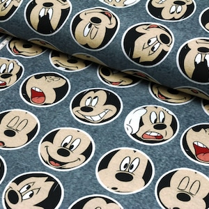 Baumwolljersey Disney Gesichter im Kreis Mickey Maus Lizenzstoff ab 0,5m (22,00/m)