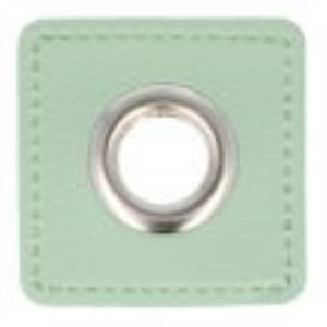 Könnte beinhalten: Ein hellgrüner quadratischer Öse mit einem silbernen Metallring. Die Öse hat einen genähten Rand.