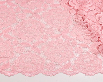 Tissu dentelle élastique pétales de rose et feuilles sur saumon de 0,5 m (10,00/mètre)