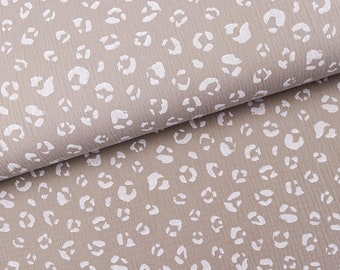 Tissu mousseline double gaze motif léopard sur beige à 0,5 m (12,00/mètre)