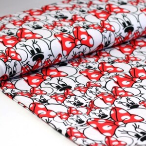 Baumwolljersey Minnie Mouse Gesichter Lizenzstoff ab 0,5m (20,00/m)