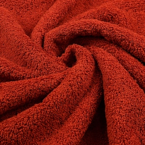 Tessuto in spugna rosso ruggine chiaro da 0,5 m (18,00/metro)