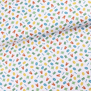 Tela de algodón popelina tejida letras de colores sobre fondo blanco desde 0,5 m (13,00/metro)