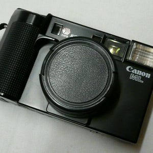 フィルムカメラ Canon CANOLITE D Canon Canolite D Flash | Blue Moon Camera
