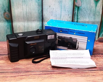 1990s Maxim 35mm Point and Shoot Film Camera with Flash + Strap, Instruction Manual