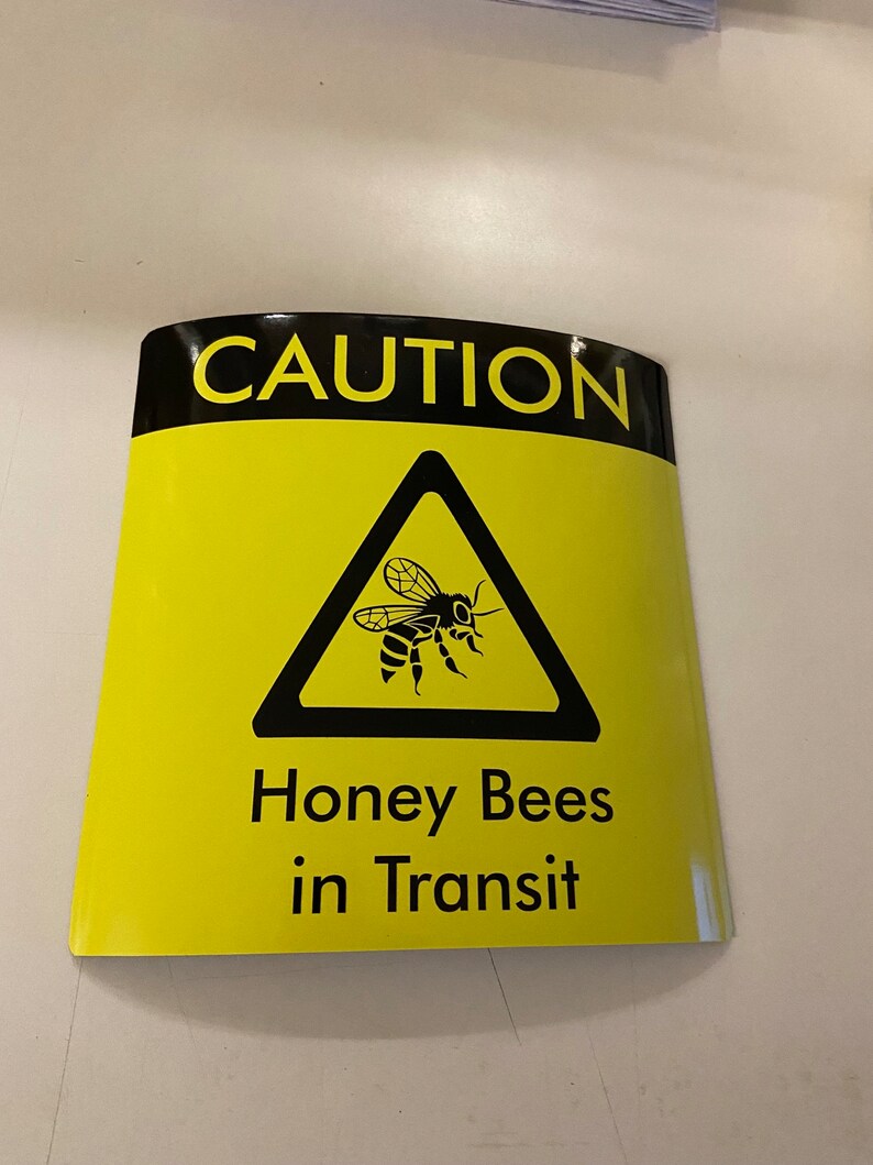 Square Bees in Transit Sign, made of magnetic material with outdoor use vinyl finish, this long lasting sign is ideal for repeated use on vans, cars and other forms of transport to warn of your precious cargo. This can be used in the same way as an L Plate and can be clipped onto any magnetic surface and also safely removed and used repeatedly.