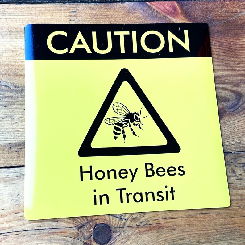 Square Bees in Transit Sign, made of magnetic material with outdoor use vinyl finish, this long lasting sign is ideal for repeated use on vans, cars and other forms of transport to warn of your precious cargo. This can be used in the same way as an L Plate and can be clipped onto any magnetic surface and also safely removed and used repeatedly.