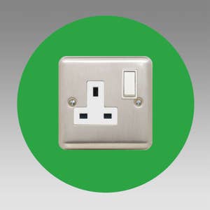 Socket surround round single made from 3mm thick acrylic in a choice of more than 16 colour options. 40mm border. Image shows light green