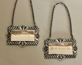 Pair of 1950s English Vodka and Bourbon Decanter Tags