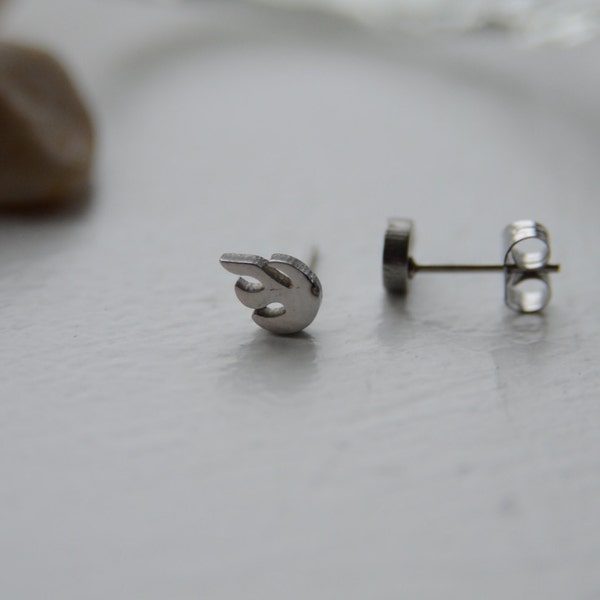 Flame stainless surgical hypoallergenic steel men's post stud earrings.