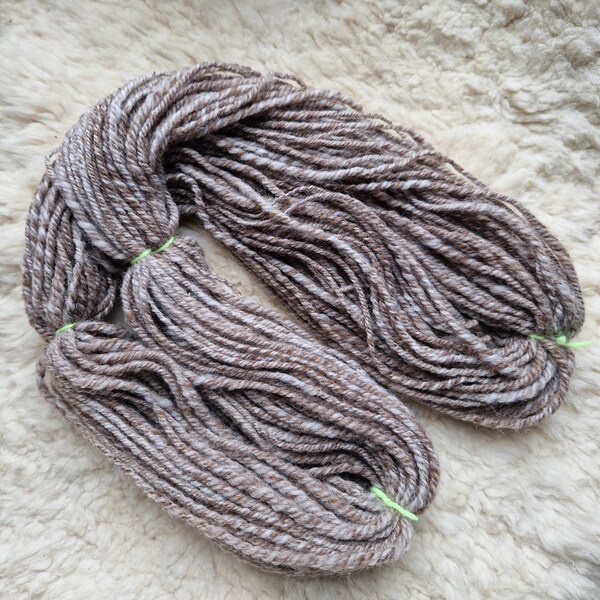 All Finnished - Hand spun yarn using zero-waste fibre. Natural blend of brown and white Finnish wool. Sustainable Spins. Aran/Chunky weight.