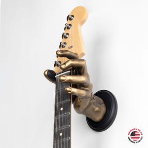 Gold GuitarGrip Hand Shaped Wall Mounted Guitar Hanger - Left Grip