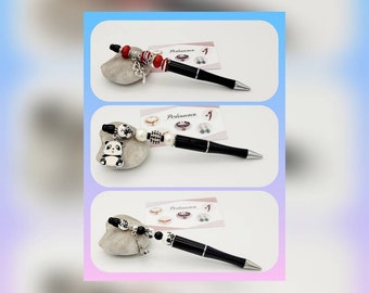 black jewel pen with beads and charms