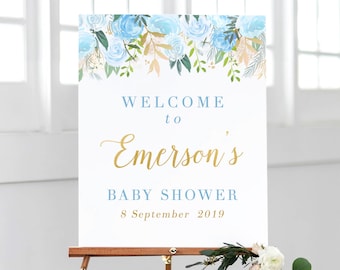 May include: Welcome to Emerson's Baby Shower sign with blue and gold floral design. The sign says "Welcome to Emerson's Baby Shower 8 September 2019".