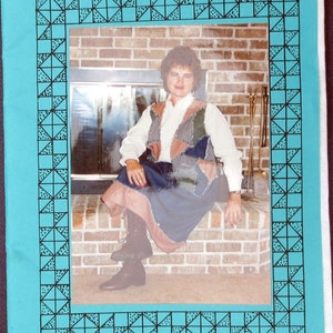 May include: A teal-colored pattern booklet titled "NANCY'S Cut Ups" with the number 953. The booklet features a photo of a person wearing a patchwork vest and skirt. The text indicates the pattern is for sizes S, M, and L.