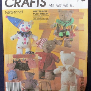 May include: A McCall's Crafts 2629 sewing pattern envelope featuring illustrations of several stuffed teddy bears in various outfits, including a clown bear, a bear with binoculars, and a white bear, with text including Meet McBear.