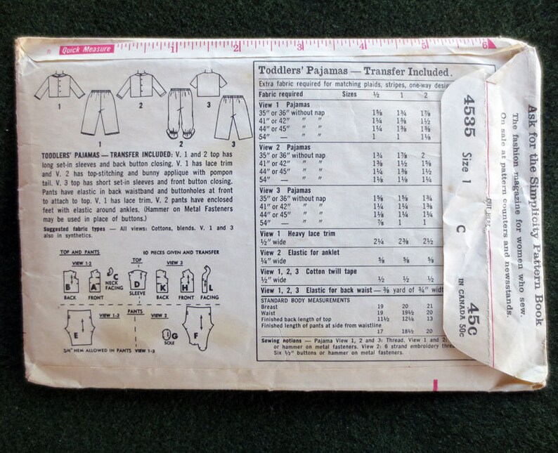 May include: Vintage Simplicity pattern for toddler pajamas, size 1. The pattern includes instructions for three pajama styles with long or short sleeves, and elastic waistbands. The envelope is cream-colored with black text and illustrations.