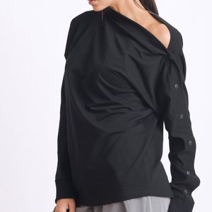 Black long sleeve top with metal buttons METT0114