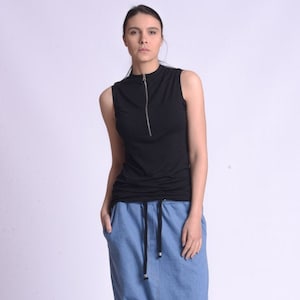 Black Sleeveless Zipper Top by METAMORPHOZA METT0186