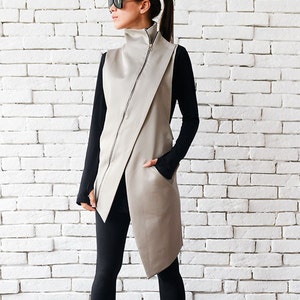 Long sleeveless vest deals