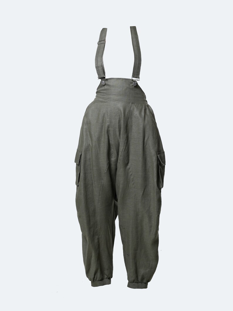 May include: Green linen overalls with adjustable straps and cargo pockets.