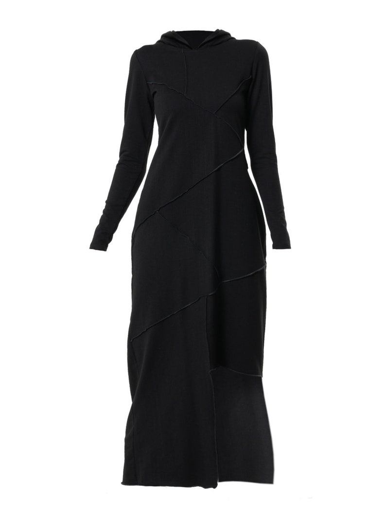 May include: Black long-sleeved hooded dress with a unique asymmetrical design featuring contrasting stitching.