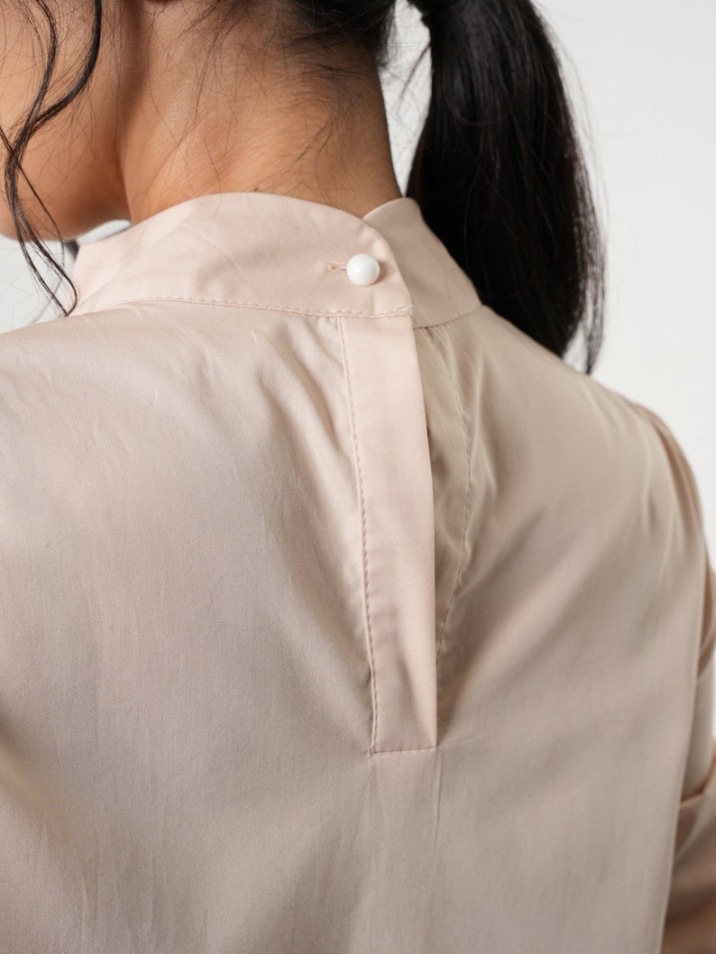 Women Asymmetrical Turtleneck Shirt with Pocket image 10