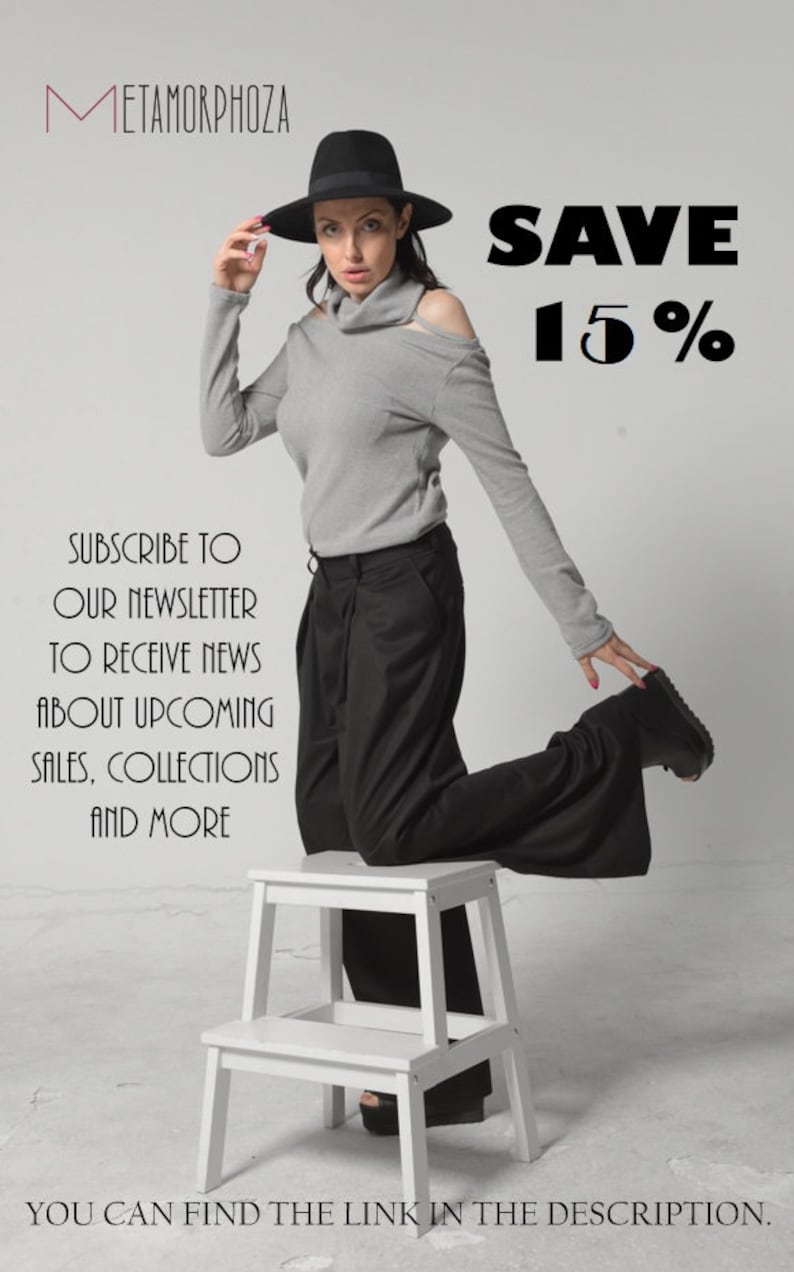 May include: A woman wearing a gray turtleneck sweater, black pants, and a black hat is standing on a white step stool. The text "SAVE 15%" is in the upper right corner of the image. The text "SUBSCRIBE TO OUR NEWSLETTER TO RECEIVE NEWS ABOUT UPCOMING SALES, COLLECTIONS AND MORE" is in the lower left corner of the image. The text "YOU CAN FIND THE LINK IN THE DESCRIPTION." is in the lower center of the image.