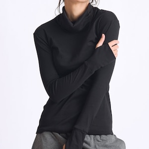 May include: A black long-sleeved shirt with a mock neck and thumbholes. The shirt is made of a soft, stretchy fabric.