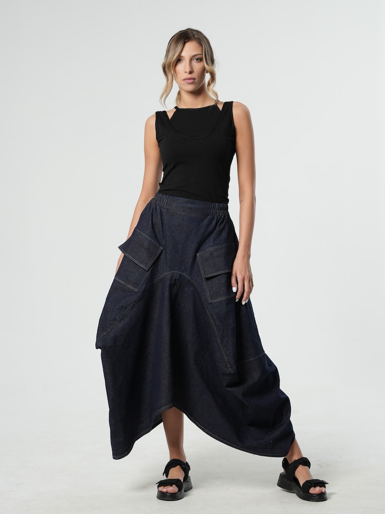 This denim skirt is a top choice for ladies who want to stand out!The draped accents make the skirt look modern and cool. Тhe waist is half elasticated and super easy to put on, giving you the chance to wear it on different parts on your stomach.