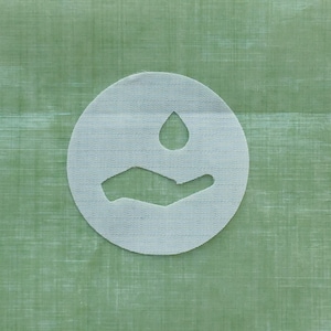 May include: A white circle with a hand holding a water drop on a green background.