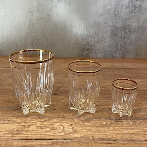 Vintage set of 15 Gold Rimmed Glasses Three Sizes