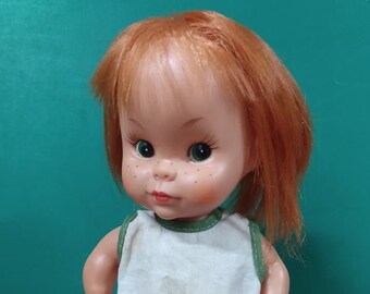 doll with red hair and freckles
