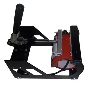 May include: A black mug press with a red heating element and a lever to clamp the mug in place. The mug press is designed to transfer images onto mugs.