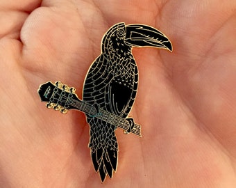 Toucan Jam negro sobre oro V2 Pin para sombrero LE50