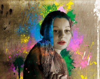 May include: A woman with blue hair and a patterned scarf poses against a colorful background of paint splatters. The background is a canvas texture.