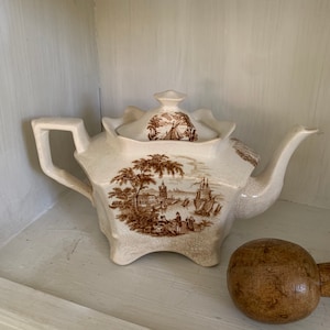 Brown and White Transferware Ironstone Tea Pot.  Royal Crownford Ironstone.  Measures 10” x 6”.