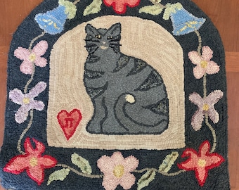 Folk Art Primitive Hand Hooked Rug by Jean Tynan.  Measures 21” x 20”.