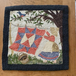 Primitive Hand Hooked Rug by Jean Tynan.  Measures 24” x 24”.