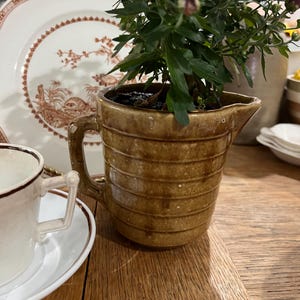 Brauner Vintage Steinzeug Ahorn Sirup Krug