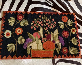 Hand Hooked Early rug by Jean Tynan.  Hooked in the Pearl McGown style.  Measures 32.3” x 20”.