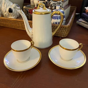 White and Gold Porcelain German Demitasse/Hot Chocolate Pot and 2 Cup and Saucer.