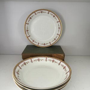 Haviland Limoges Set of 4 Soup/Salad Dishes.  Measures 7.5” x 1.5”.  One chip.  Sold as is.