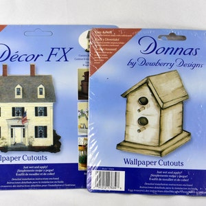 May include: Two packages of wallpaper cutouts, one featuring a brown and white birdhouse with the text "Donnas by Dewberry Designs" and the other featuring a white and yellow house with the text "Décor FX". Both packages have the text "Wallpaper Cutouts" and instructions to "Just wet and apply".