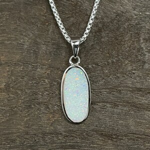 Sterling Silver Opal Pendant: Oval Fire Opal, Simple Design