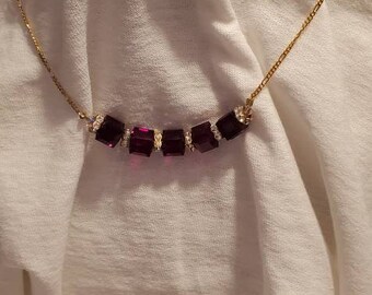 Five cube Garnet Swarovski necklace And earrings with gold and aurora squaredelles and Gold Plated chain.  Length, 19 1/2".